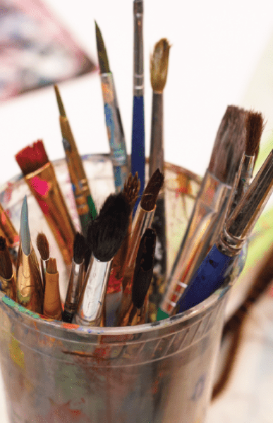 PAINT BRUSHES IN A CUP